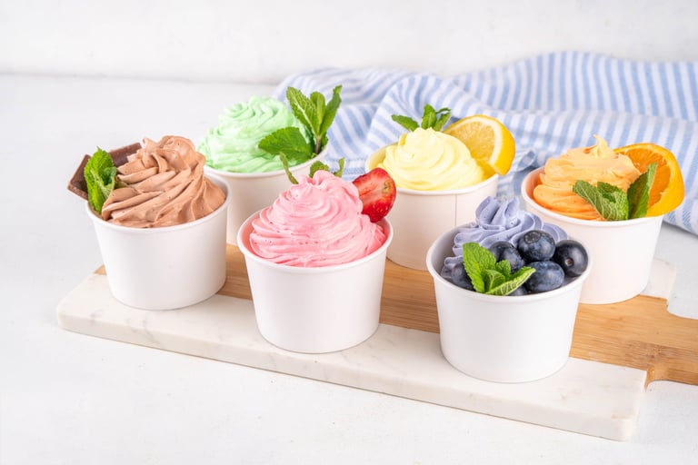 Frozen yogurt assortment with soft creamy ice cream with chocolate, vanilla, berry, fruit flavors